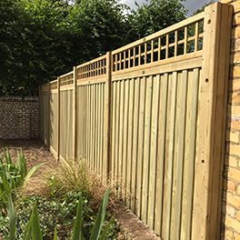 wooden fencing with trellis top